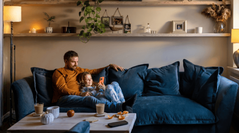 Father and daughter sitting together